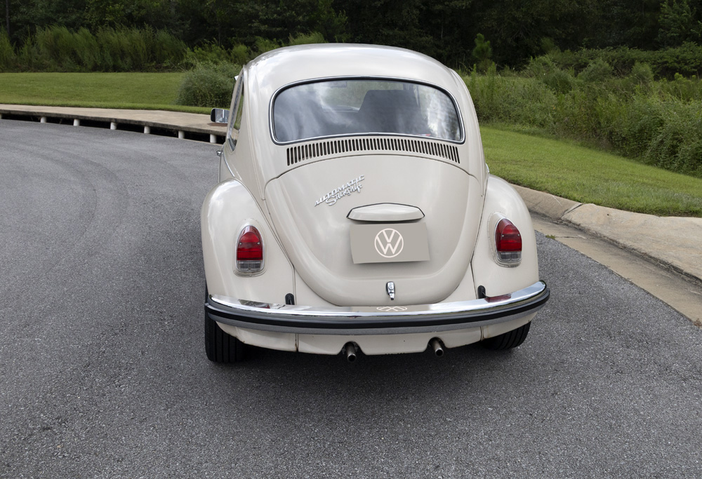 Vintage 1968 Volkswagen Bug with upright headlights and one piece bumpers