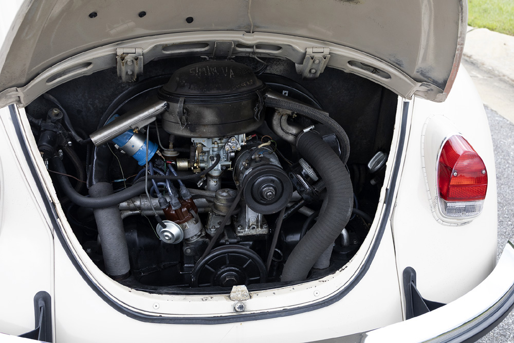 Vintage 1968 VW Beetle engine bay showing 1500cc air cooled motor