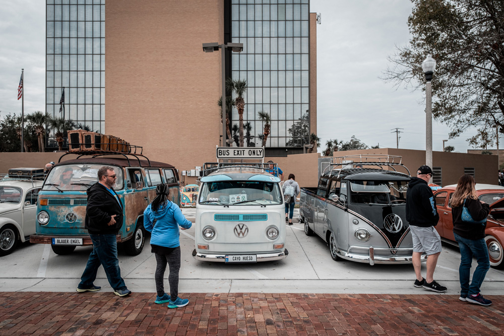 Vintage VW buses and trucks parked at an outdoor Volkswagen show during the 2026 event season