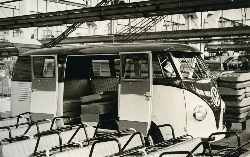 VW Bus in two-color paint finish during installation of the interior at Volkswagen Wolfsburg 1955